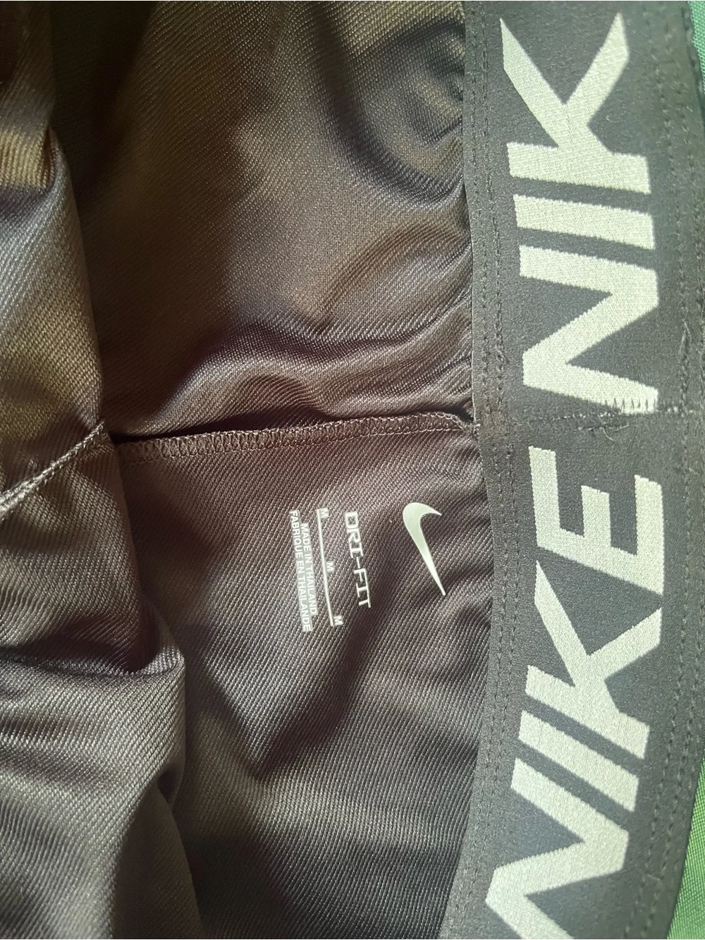 Nike Women's Athletic Shorts in Dark Brown with White Swoosh